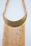 Tassell necklace made with beads.