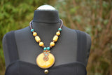 Charming necklace made with wood, beads and glass