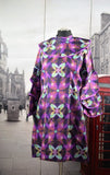 High-Neck Dress with Ruffle Layered Sleeves and side pockets.